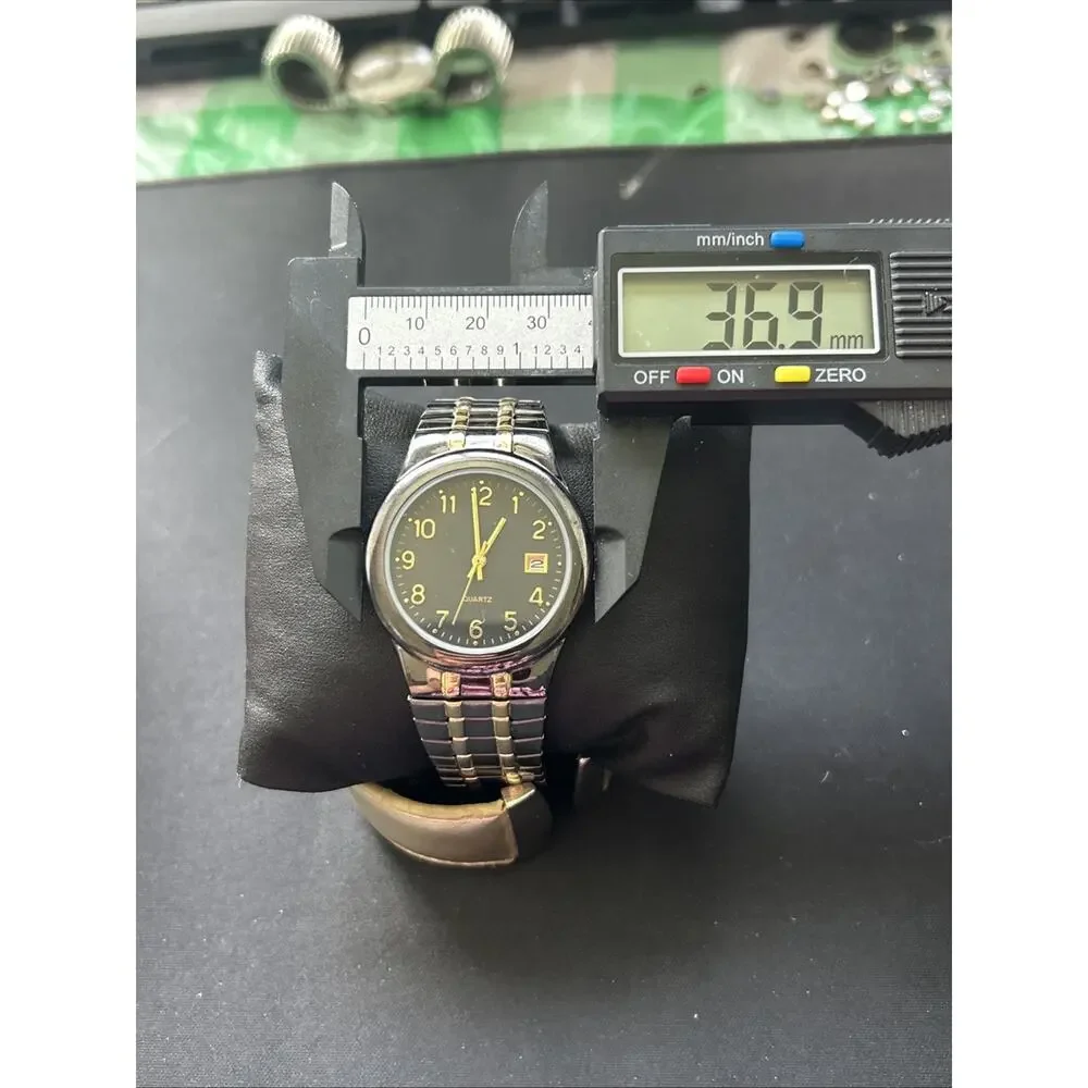 Black And Gold Tone Stretch Band Quartz Watch
